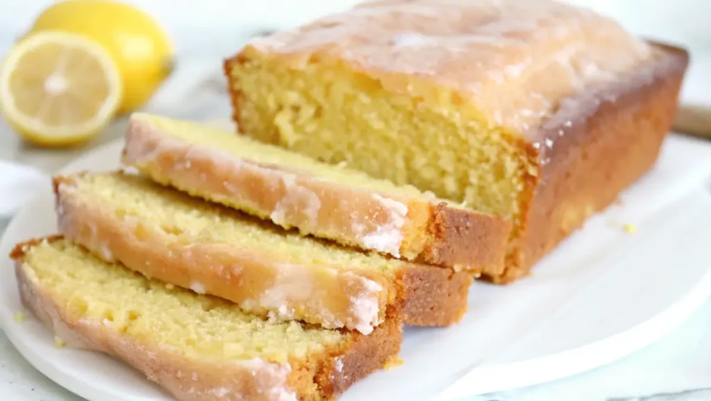 Freshly baked lemon drizzle cake with lemon glaze